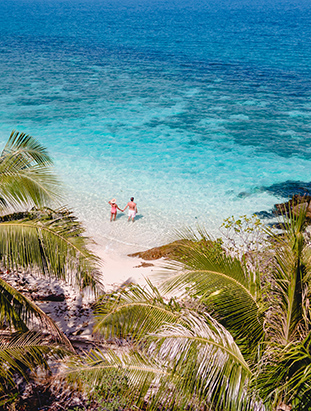 Drone aerial view at Koh Wai Island Trat Thailand is a tinny tropical Island near Koh Chang. a young couple of men and women on a tropical beach during a luxury vacation in Thailand